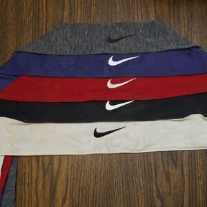 Nike Kids' Leggings in Cream, Black, Red, Purple, and Gray